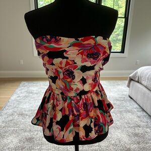 Strapless peplum floral top with corset tie back